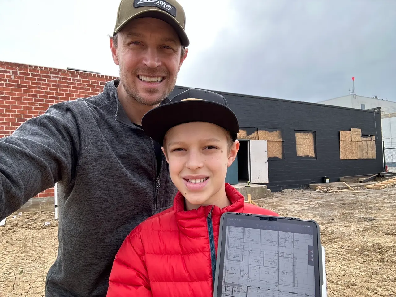 Going over the floor plans on site.